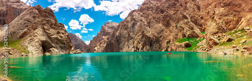 Mountain blue lake among the rocks. Beautiful landscape. Wonderful nature. Long banner, panoramic view photo