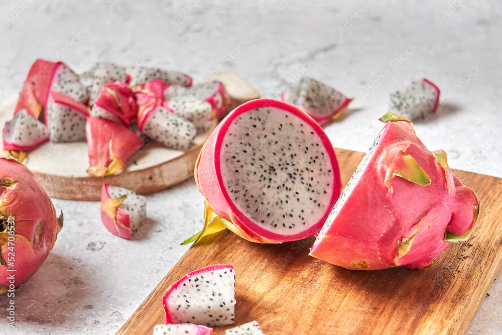 fruit with medicinal properties. Pitahaya dragon fruit on a wooden board. fruit with medicinal properties. Pitahaya dragon fruit on a wooden board.