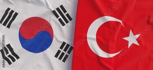 Flags of South Korea and Turkey. Linen flag close-up. Flag made of canvas. Korean, Seoul. Turkish. State national symbols. 3d illustration.