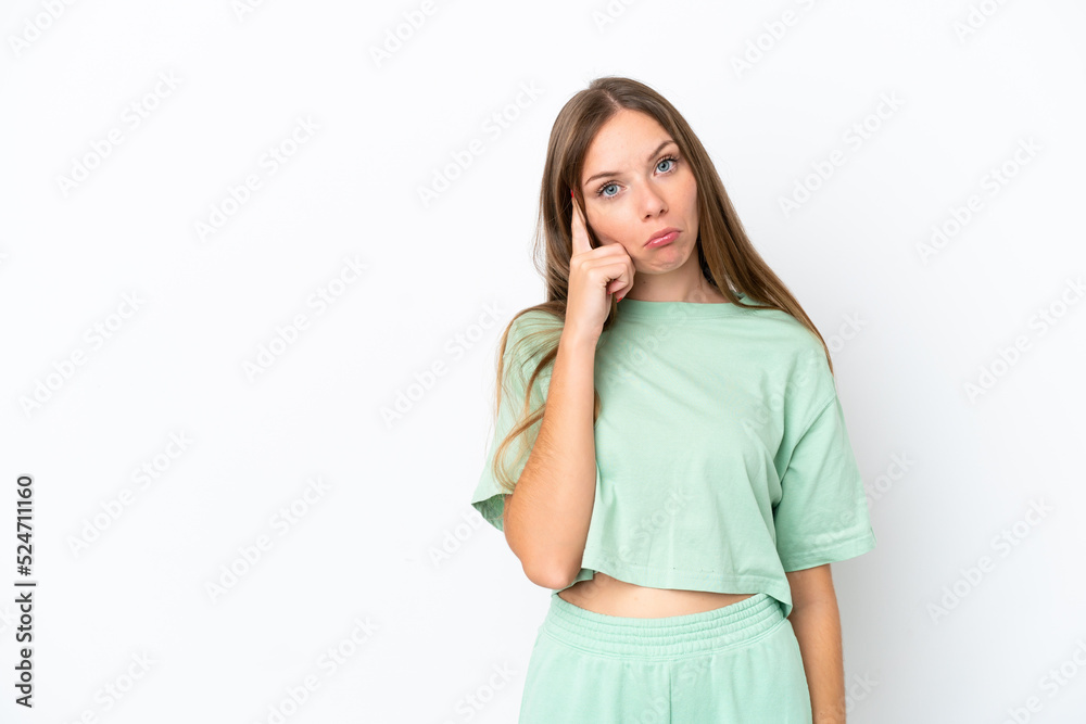 Young Lithuanian woman isolated on white background thinking an idea Young Lithuanian woman isolated on white background thinking an idea