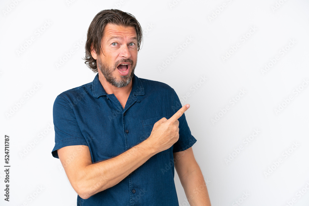 Senior dutch man isolated on white background surprised and pointing side Senior dutch man isolated on white background surprised and pointing side