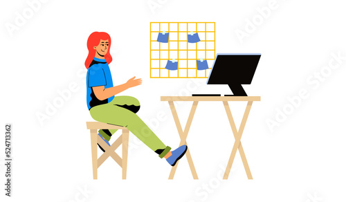 The girl works, studies at her desk. Computer desk, workplace. The concept of studying, working online