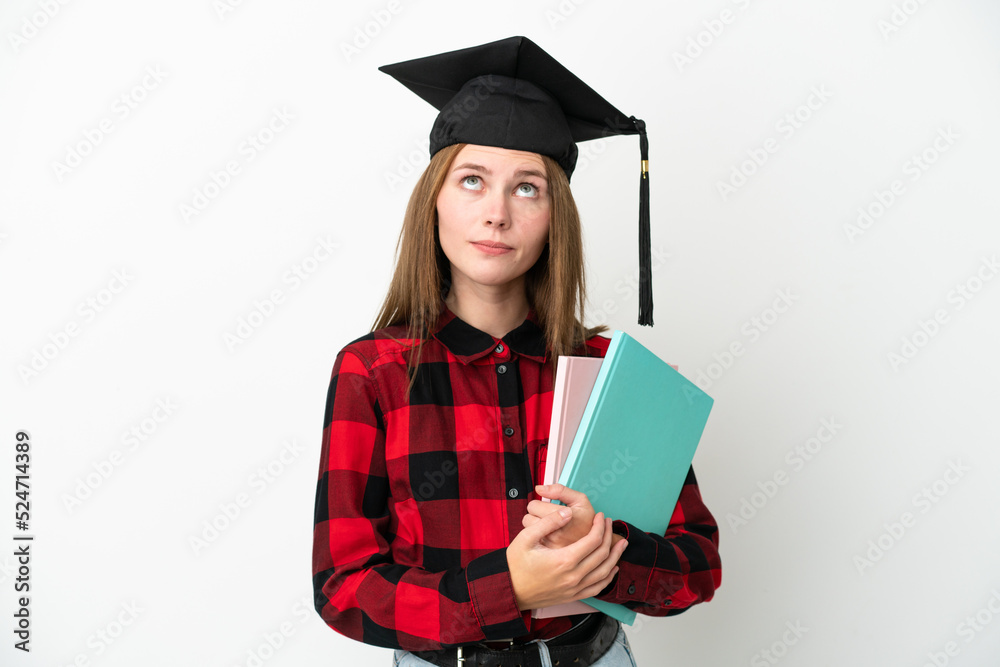 Young English student woman isolated on white background and looking up Young English student woman isolated on white background and looking up