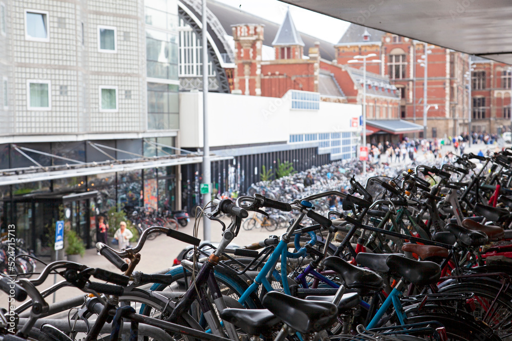 Naklejka premium Bicycles parking near Central Station. Amsterdam, Netherlands, 22.07.2022