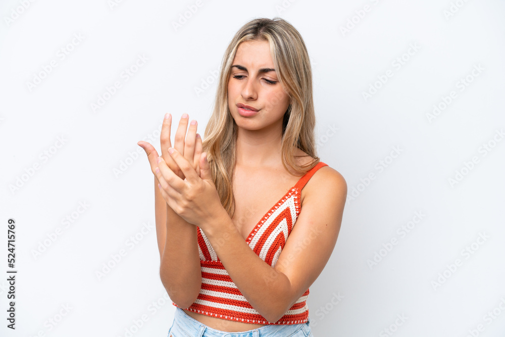 Fototapeta premium Young caucasian woman isolated on white background suffering from pain in hands