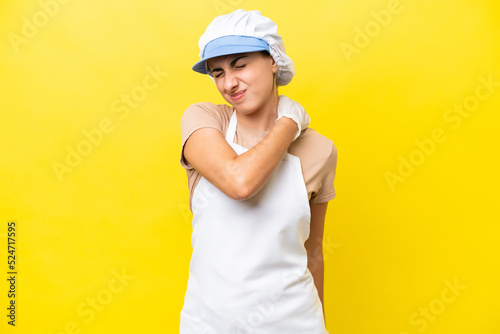 Fishwife woman over isolated background suffering from pain in shoulder for having made an effort