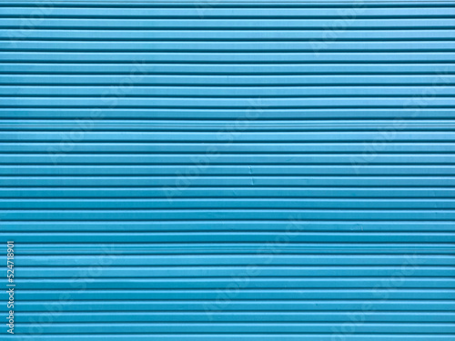 blue steel loading dock roll up door shipping receiving corrugated metal garage