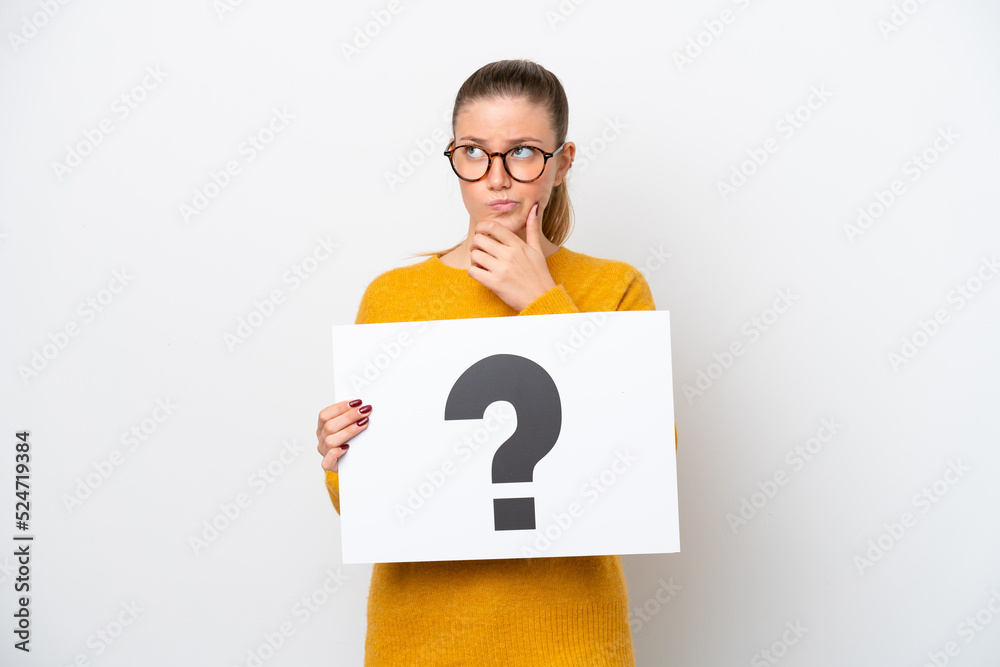 Young caucasian woman isolated on white background holding a placard with question mark symbol and thinking Young caucasian woman isolated on white background holding a placard with question mark symbol and thinking