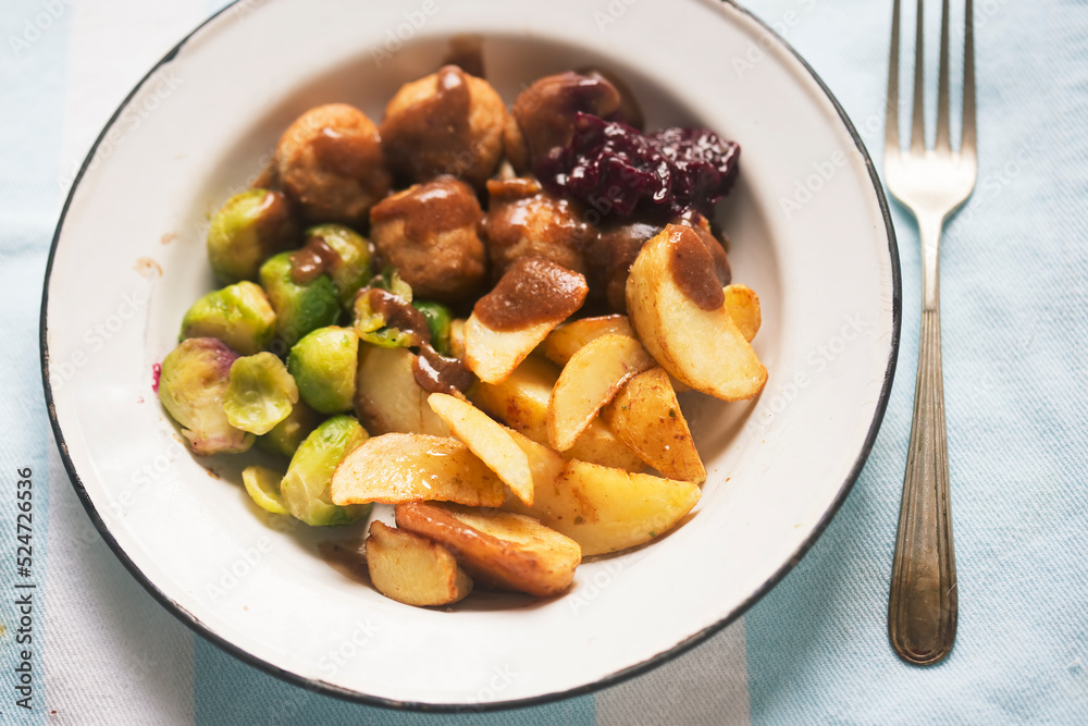 Chicken meatballs with roasted potatoes with brussel sprouts and cabbage Chicken meatballs with roasted potatoes with brussel sprouts and cabbage