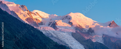 The panorama of Mont Blanc massif in the sunset light.