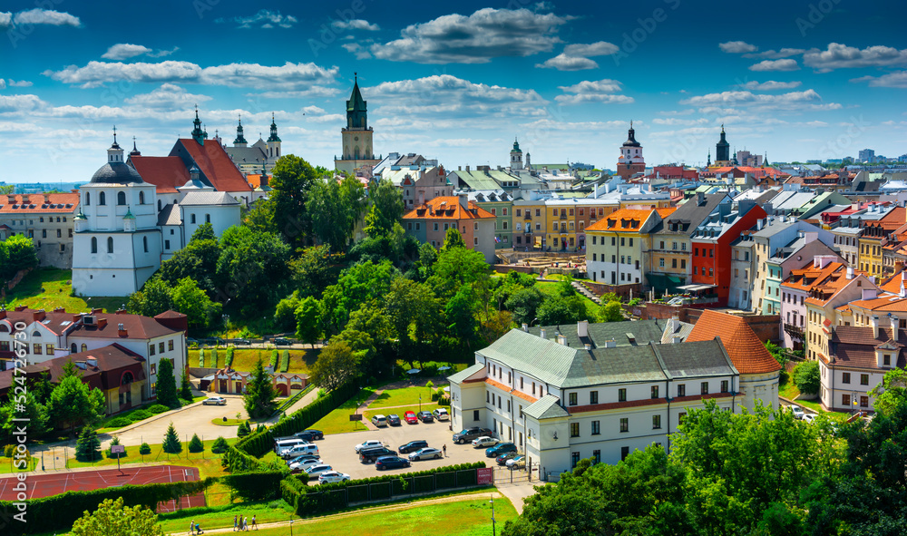 Lublin, Lubelskie Voivodeship / Poland - July 24 2022: View of the old town from the castle tower of the royal castle in Lublin. - obrazy, fototapety, plakaty 