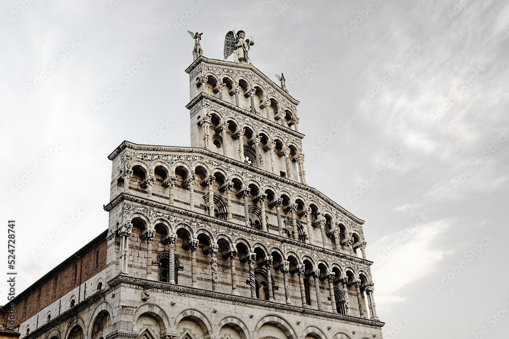 Facade of the Roman Catholic basilica church of San Michele in Foro in the city of Lucca, Tuscany, Italy. Dates from 13 C.