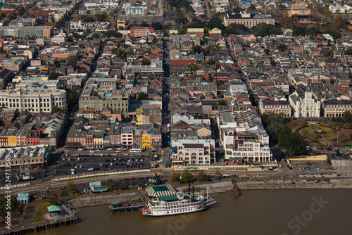 New Orleans, Louisiana, USA, January 10th 2022. The view of the downtown, the Mississippi river, and a steamer from a helicopter. © Alena V