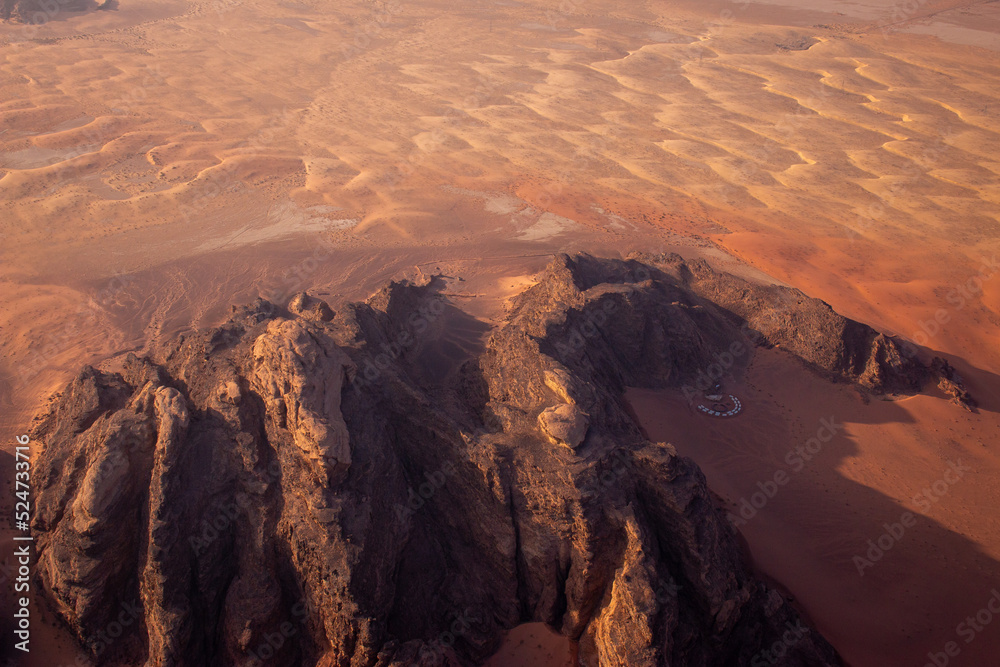 A camp in Wadi Rum desert, the view from a hot air balloon basket, Jordan