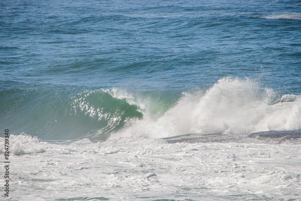 wave known as shorebreak at post six on Copacabana Beach in Rio de Janeiro, Brazil.