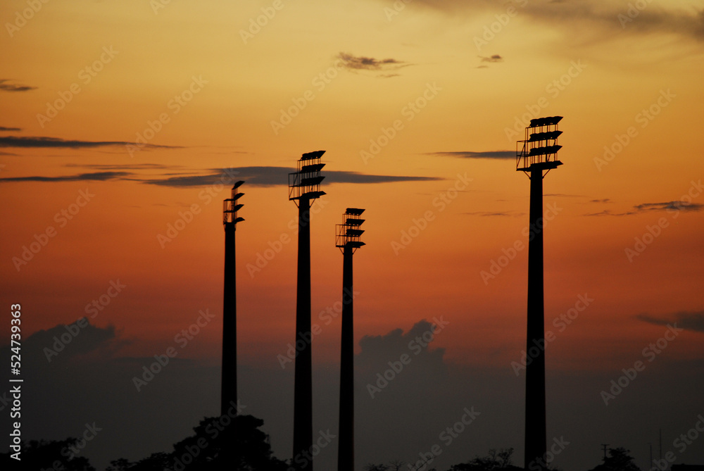 Headlights of a stadium at sunset. sports area