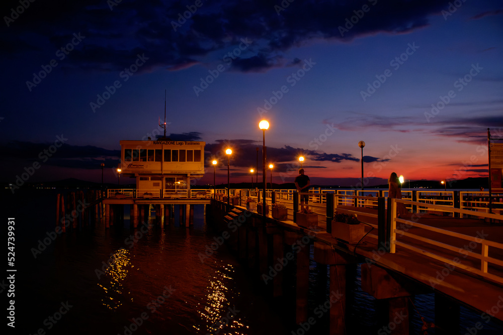 Sunset on lake Trasimeno from Passignano, Italy	