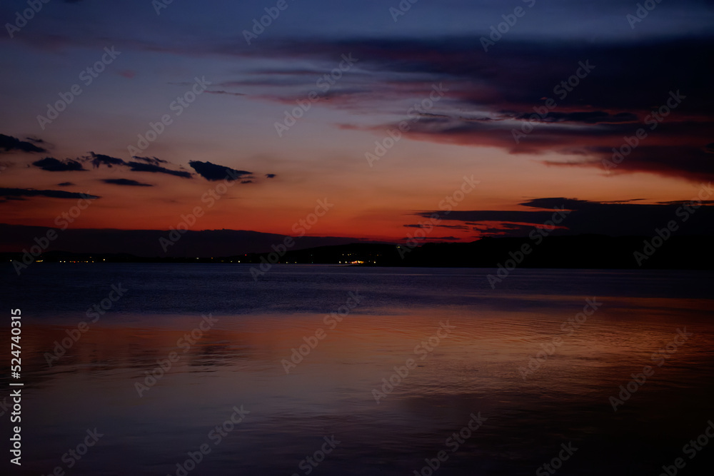 Sunset on lake Trasimeno from Passignano, Italy Sunset on lake Trasimeno from Passignano, Italy