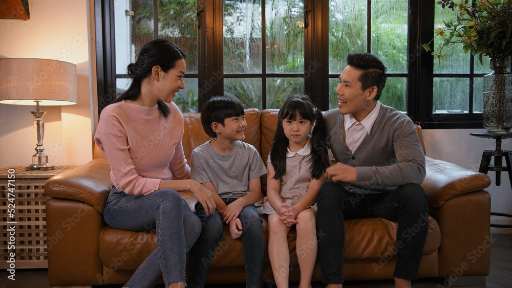 Family concept of 4k Resolution. Asian parents and children chatting together in the house. Family concept of 4k Resolution. Asian parents and children chatting together in the house.