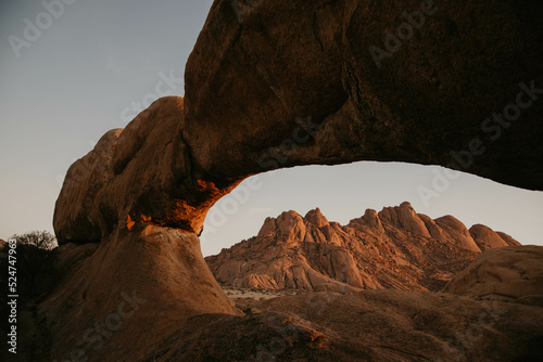 epic beautiful arch in red rock of namibia desert