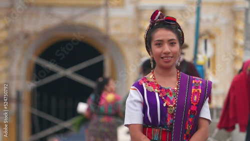 Portrait of an indigenous woman looking at the camera smiling and happy. Hispanic woman.