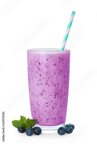 Glass of blueberry smoothie, fresh berries and mint isolated on white