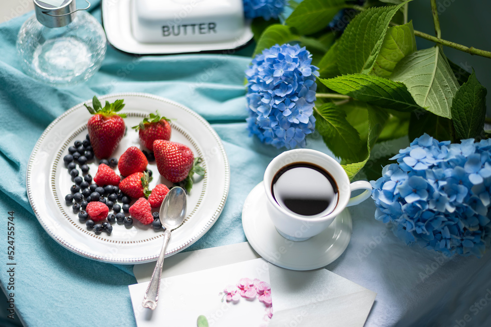 Berries and coffee, blue gogrtensia flowers. Morning coffee. Berries and coffee, blue gogrtensia flowers. Morning coffee.