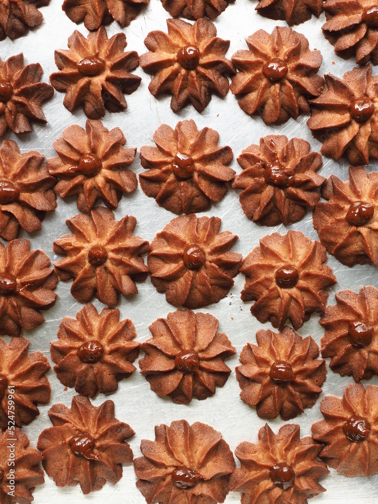 top view flower shaped cinnamon cookies top view flower shaped cinnamon cookies