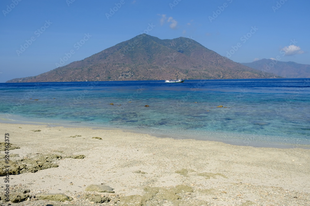Indonesia Alor Island - Coastline view to volcanic Ternate Island