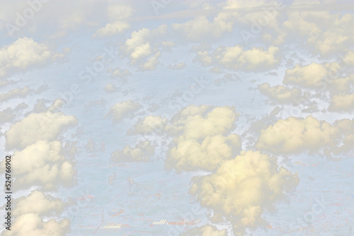 Fototapeta Naklejka Na Ścianę i Meble -  Cloud in sky atmosphere from airplane, out of windows is cloudscape cumulus heaven and sky under Sun. View from above cloud is beautiful with abstract background climate weather at high level