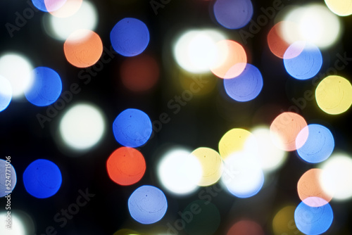 multicolored festive lights on a black background screensaver backdrop