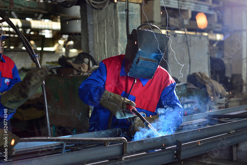 worker steel, welder on factory