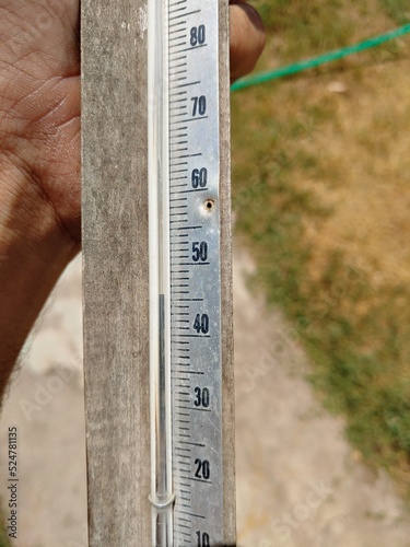thermometer in hand 