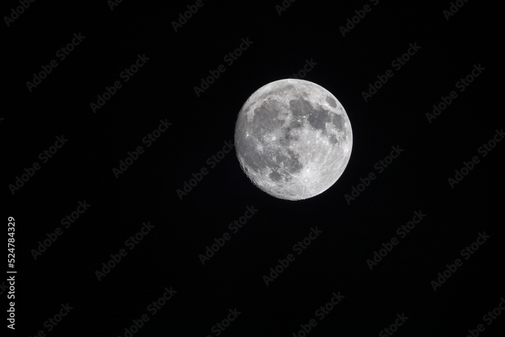 Nearly full moon with details of craters and shadows Nearly full moon with details of craters and shadows