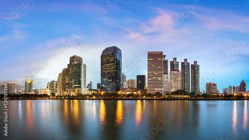 Bangkok Cityscape  Business district with Park in the City at dusk  Thailand 