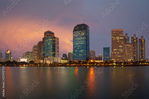 Bangkok Cityscape with building in an economic business district from Benjakitti park at dusk. (Thailand) © molpix