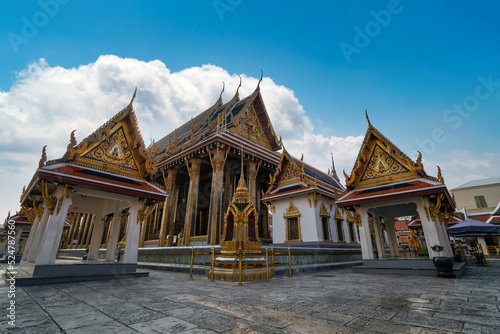 Wat Phra Kaew, Bangkok landmark of Thailand. Temple of the Emerald Buddha at blue sky. Landscape of beautiful architecture in Bangkok.