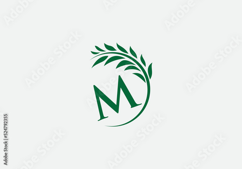 Green leaf and laurel wreath logo design vector with the letter and alphabet M