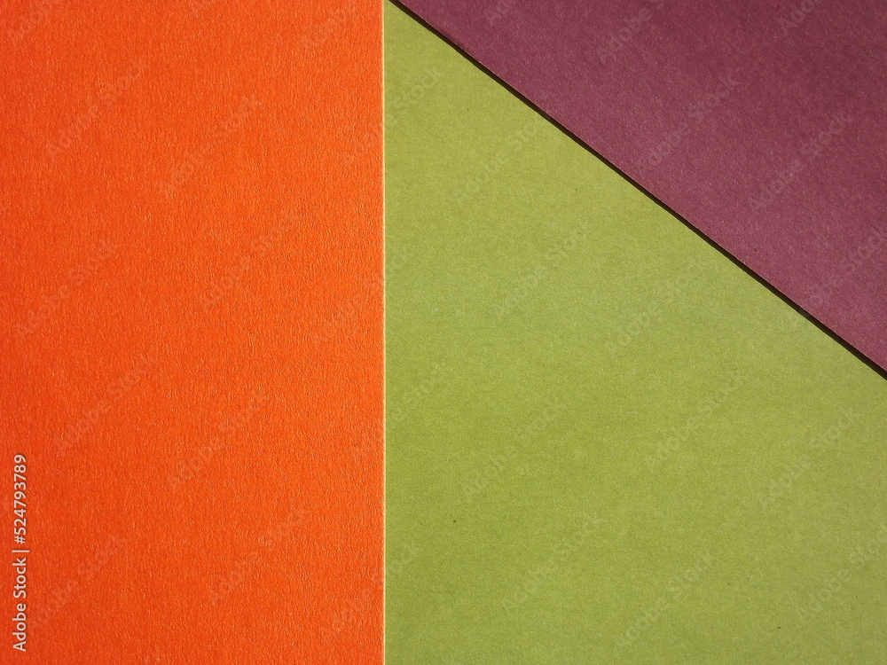 Orange green burgundy geometric surface as background Orange green burgundy geometric surface as background