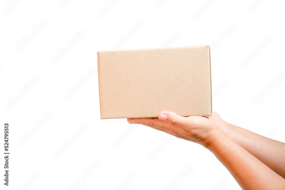A parcel cardboard parcel box in a delivery woman person hands isolated on white background. Delivery service concept. Asian Young girl holding a package is a delivery business entrepreneur.