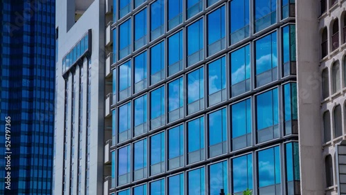 Wallpaper Mural A timelapse of cloud reflecting the building in the business town long shot Torontodigital.ca