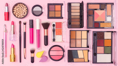 Make up products pattern on pink background. Flat lay