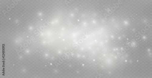 Dust sparks and stars shine with a special light. Christmas light effect. Glittering particles of magic dust.Vector sparkles on a transparent background.