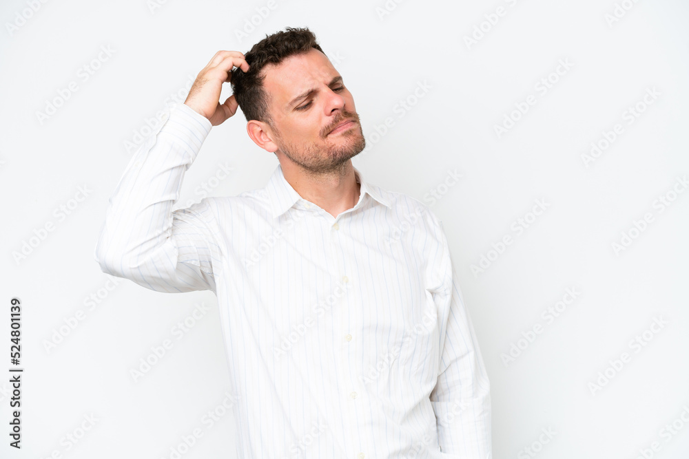 Young caucasian handsome man isolated on white background having doubts while scratching head Young caucasian handsome man isolated on white background having doubts while scratching head