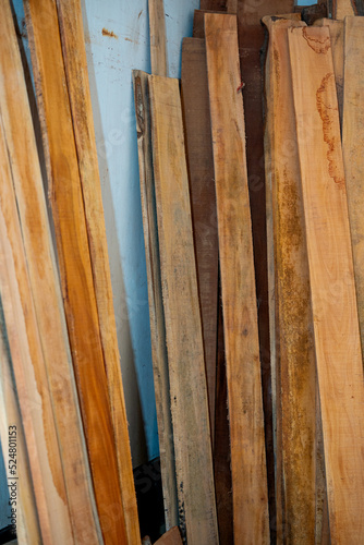 Eucalyptus Wood Plank With Blur Background. Wood Planks Are Stored For Making Wooden Furniture. Selective Focus, Copy Space.