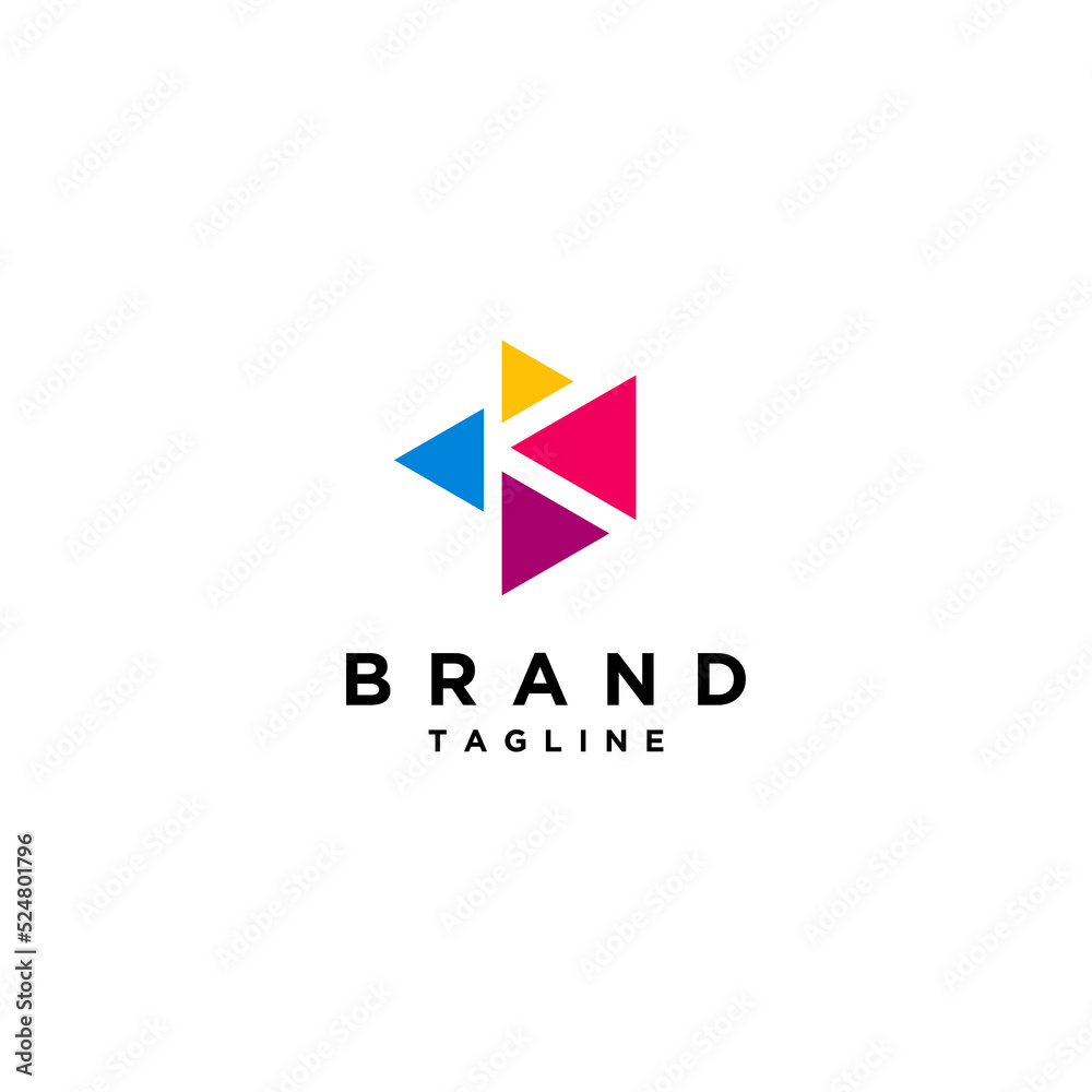 The letter K is in the negative space between four colorful triangles. Four Colorful Triangles With the Letter K in the Center. The letter K is in the negative space between four colorful triangles. Four Colorful Triangles With the Letter K in the Center.