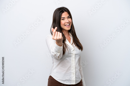 Young Brazilian woman isolated on white background making money gesture