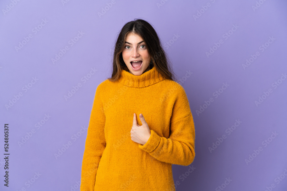 Young caucasian woman isolated on purple background with surprise facial expression Young caucasian woman isolated on purple background with surprise facial expression
