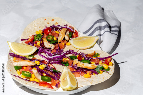 Homemade Mexican Tacos with fresh vegetables and chicken
