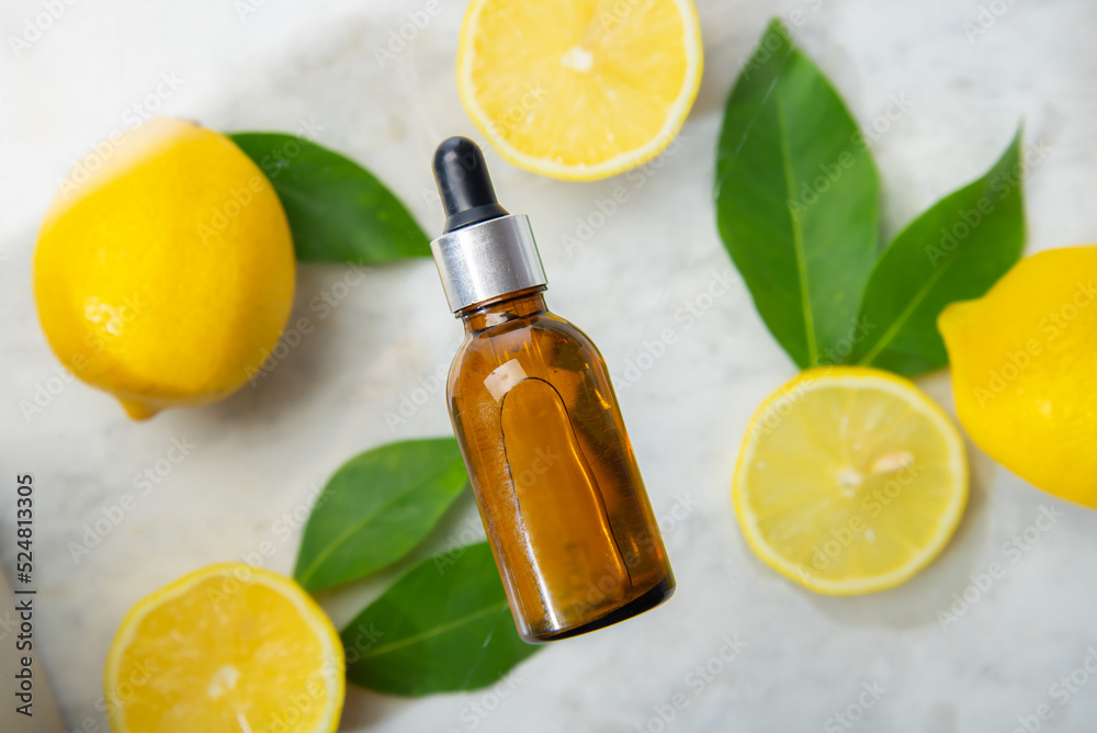 essential oil bottle with lemon